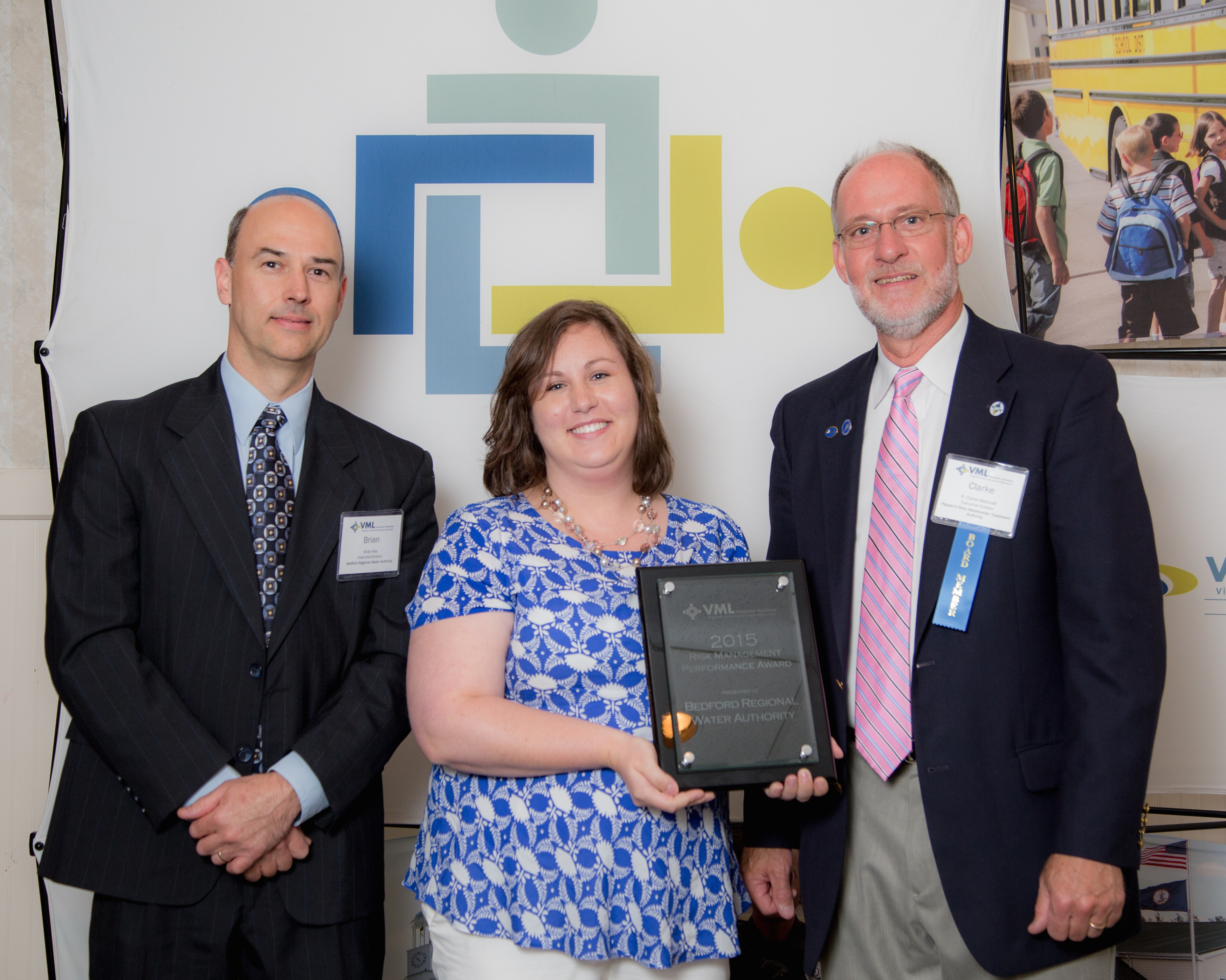 (L to R): Bedford Regional Water Authority Executive Director Brian Key and HR Manager Bethany Shamblin accept the award with VMLIP Members’ Supervisory Board Member Clarke Wallcraft 