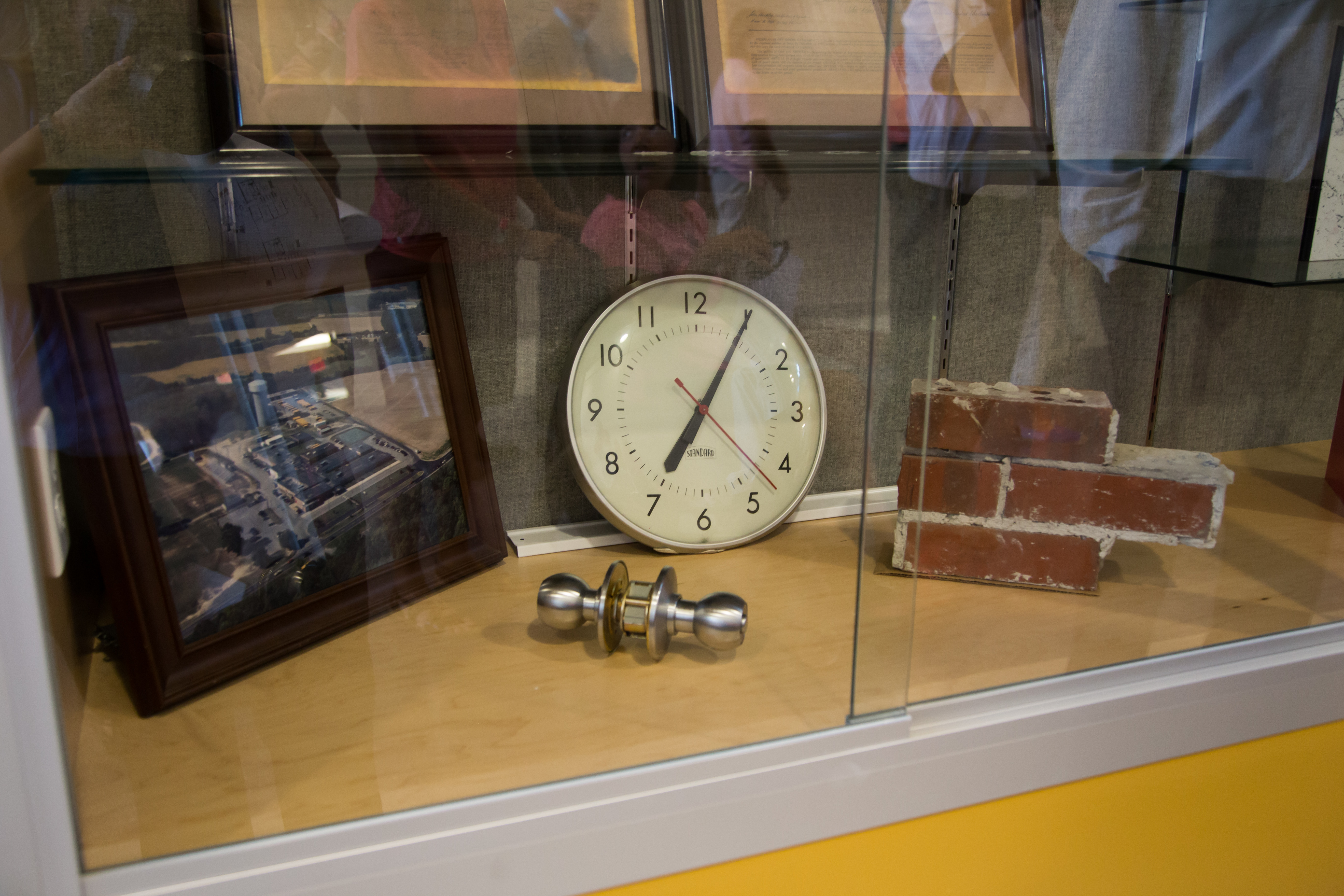 Showcased in the new Page Middle School are bricks, a clock and other memorabilia to remember the tornado